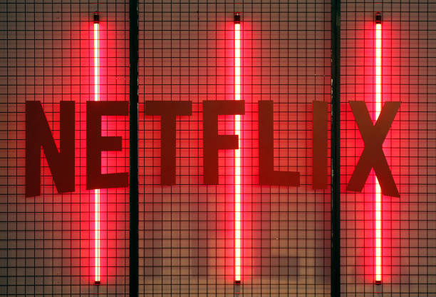 Netflix logo is displayed during the 'Paris Games Week' on November 02, 2017 in Paris, France. Netflix is an American company offering streaming...